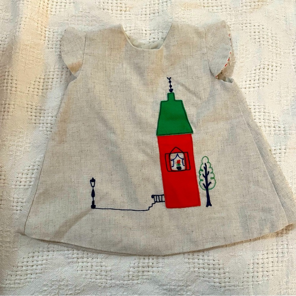 Vintage embroidered house swing top
